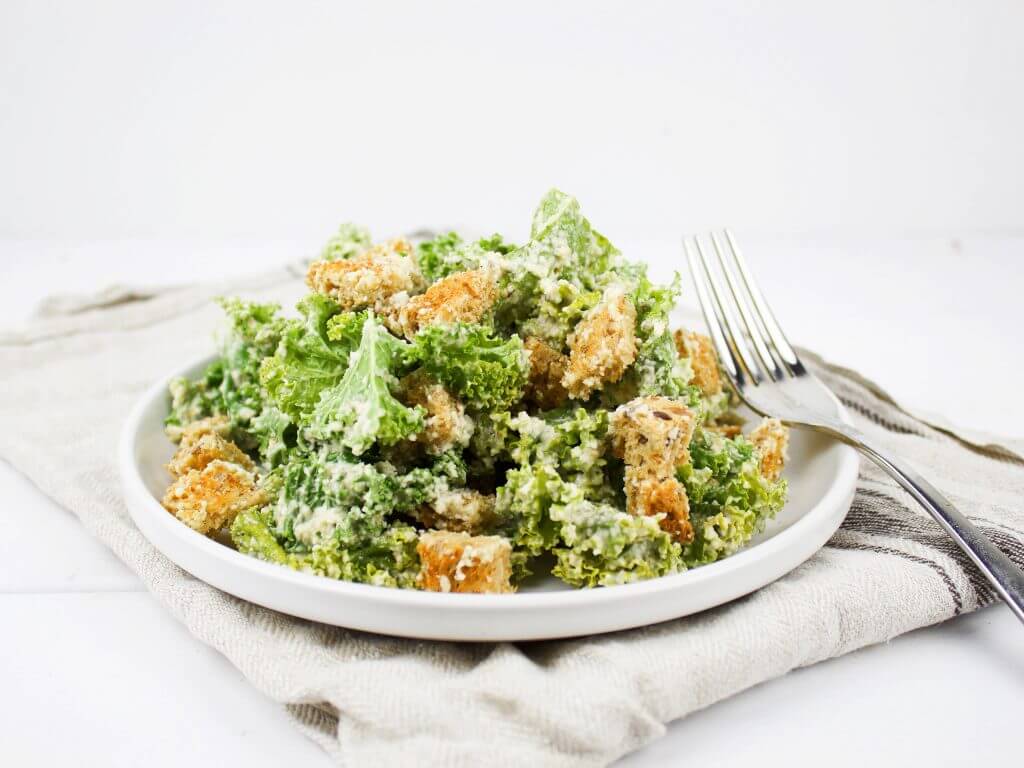 Easy kale vegan Caesar salad with roasted garlic