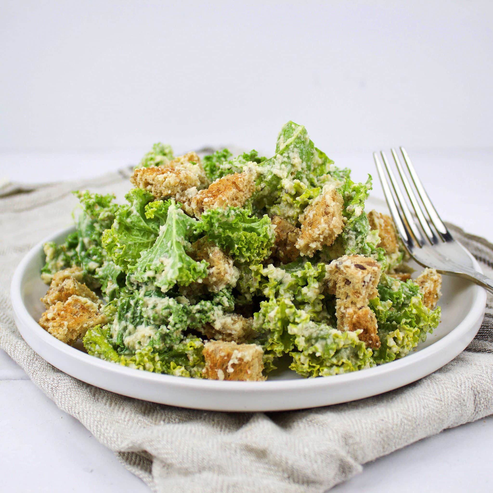 Easy kale vegan Caesar salad with roasted garlic