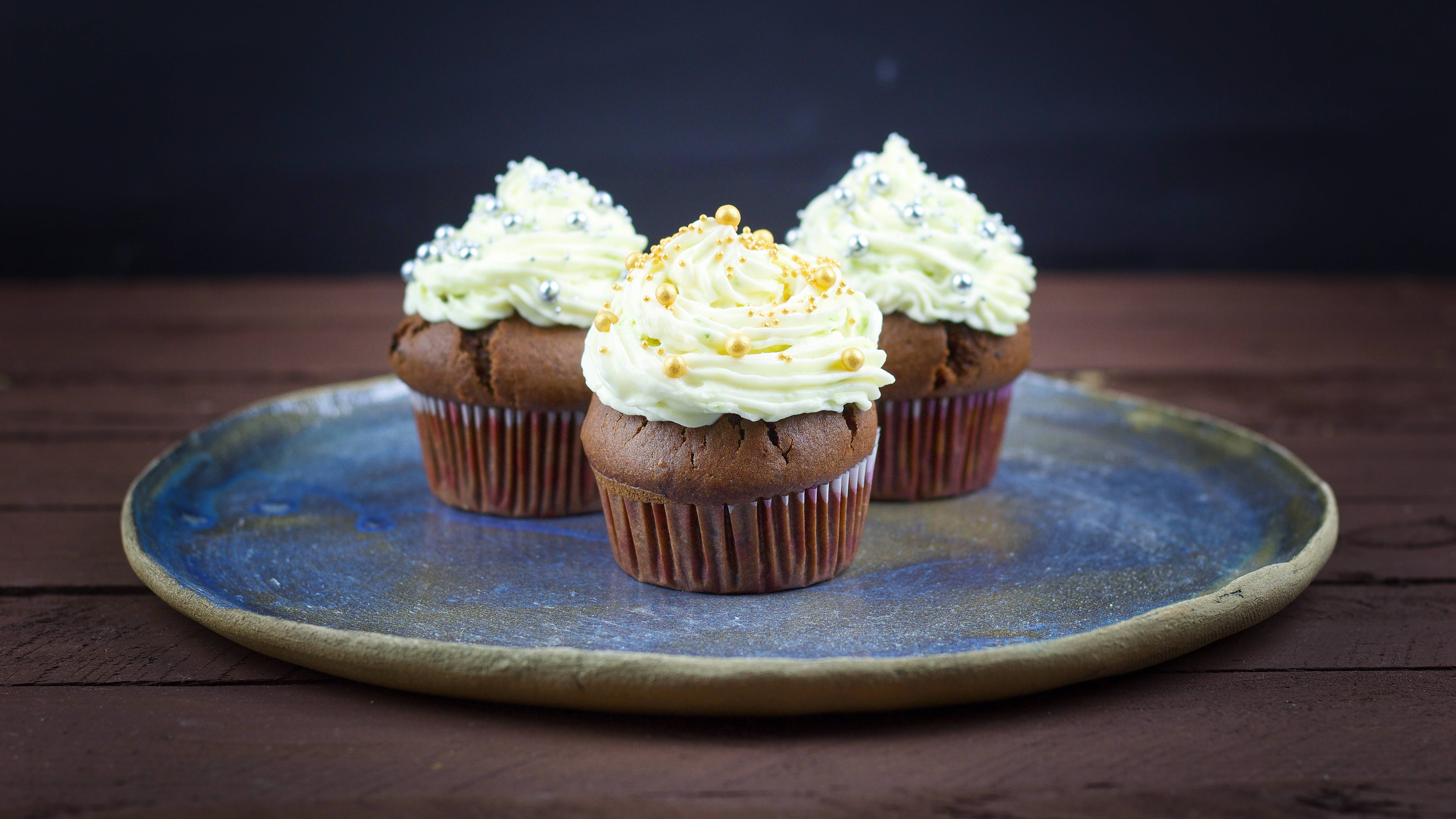 Easy chocolate muffins with cream cheese and mascarpone frosting.