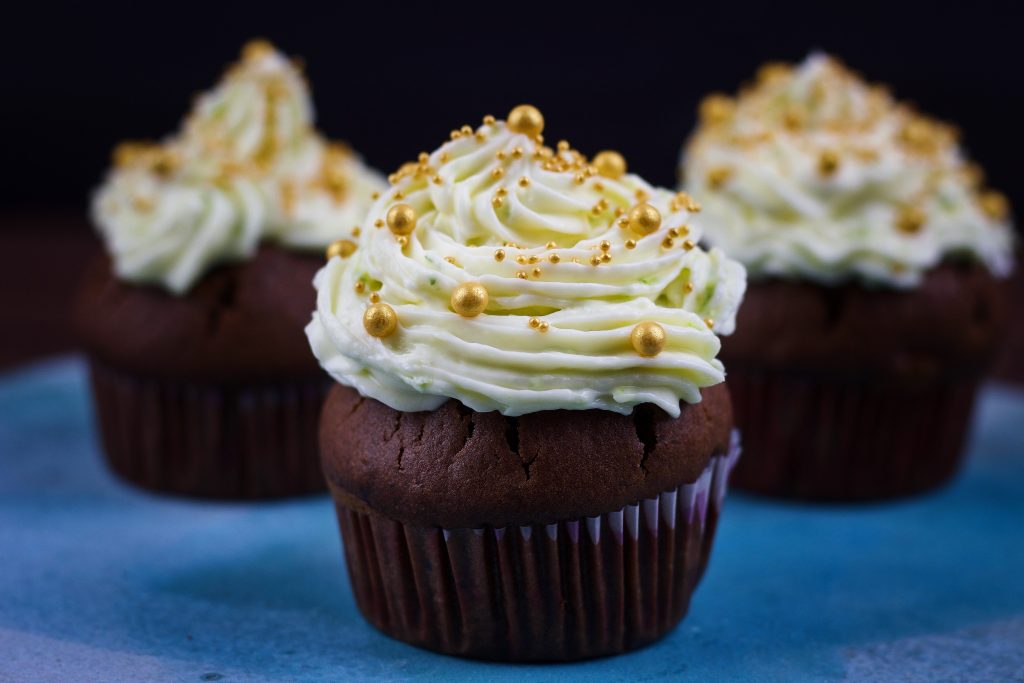 Easy chocolate muffins with cream cheese and mascarpone frosting.