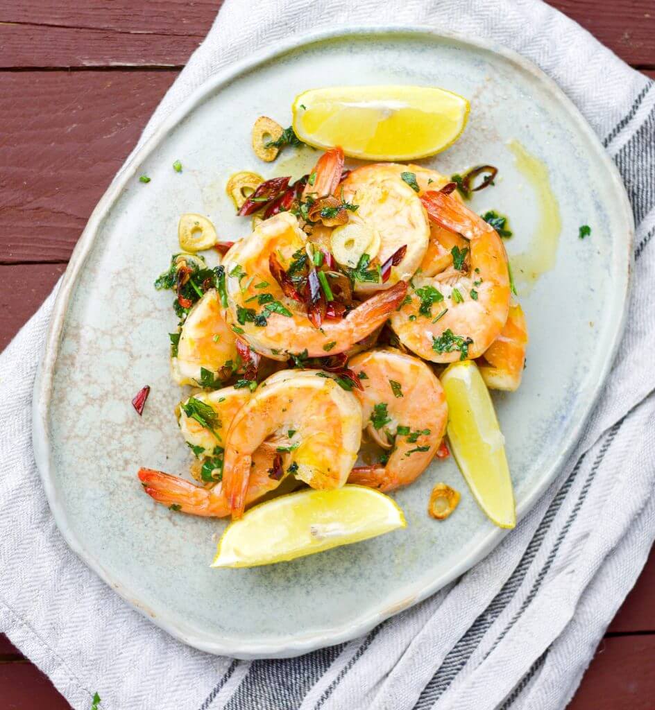 5 minutes tiger prawns with garlic, chilli, and parsley.