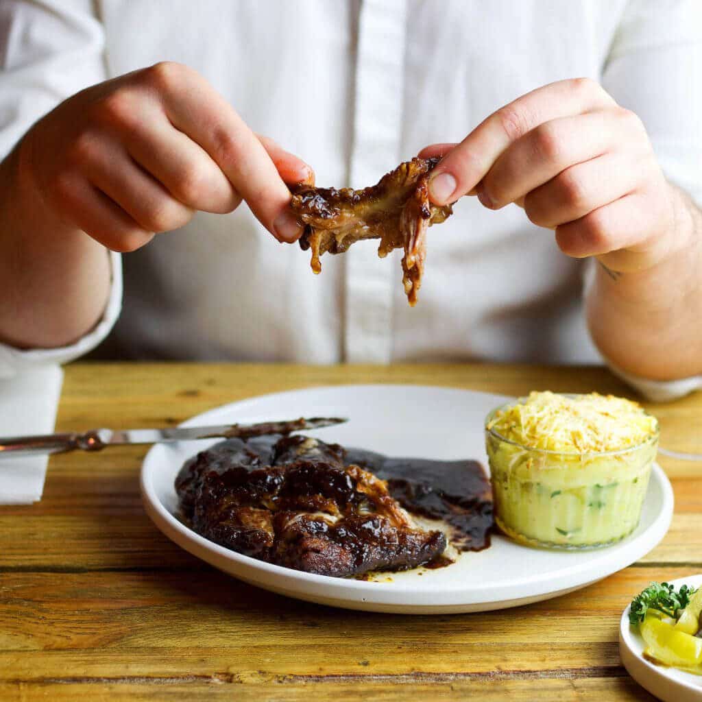Slow roasted BBQ ribs with creamy sauce, and baked mashed potatoes with smoked cheese.