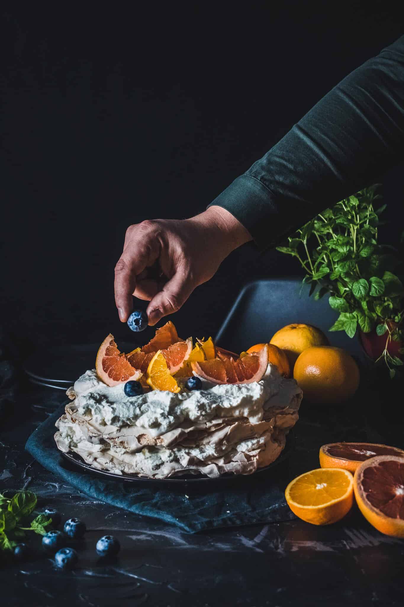 Blood orange Pavlova with blueberries.